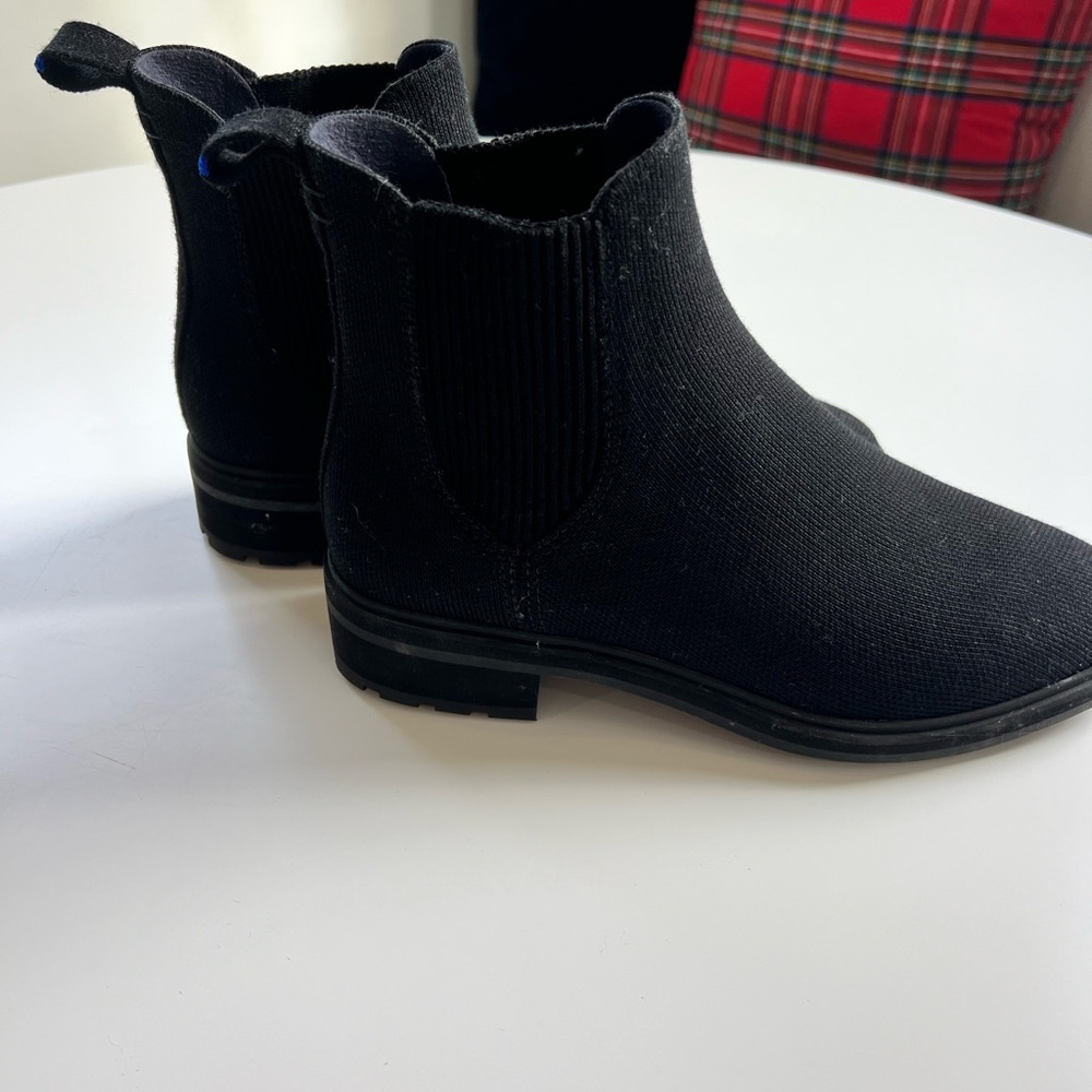 Black knit Rothy boots
Brand new!